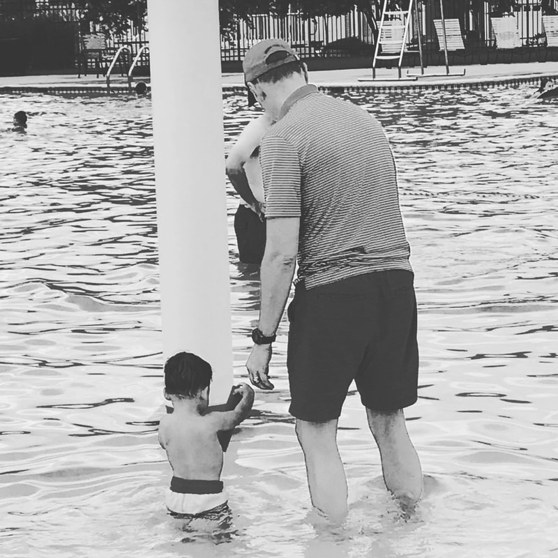 man with his son