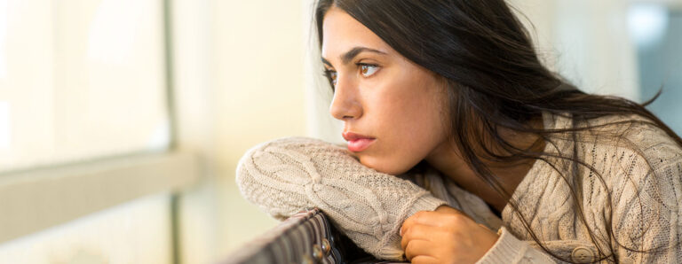 Woman thinking about pregnancy options