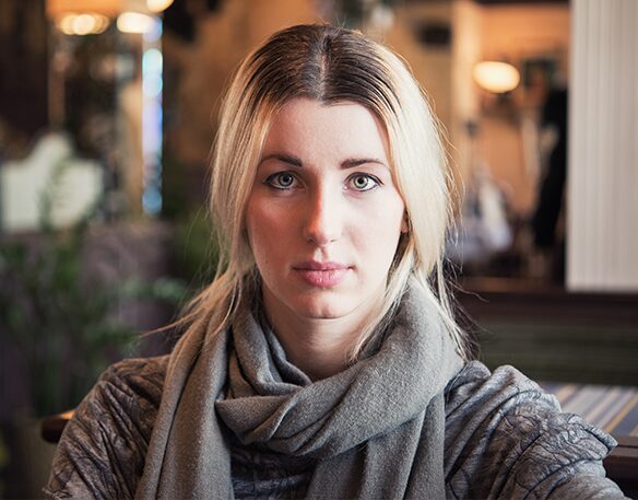 a woman thinking about pregnancy symptoms